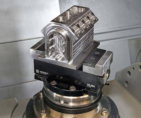 Vice holds cylindrical or prismatic parts for 5-axis machining